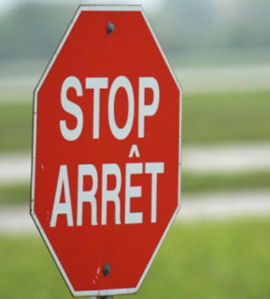 Panneau "Stop-arrt", en bilingue franais-anglais